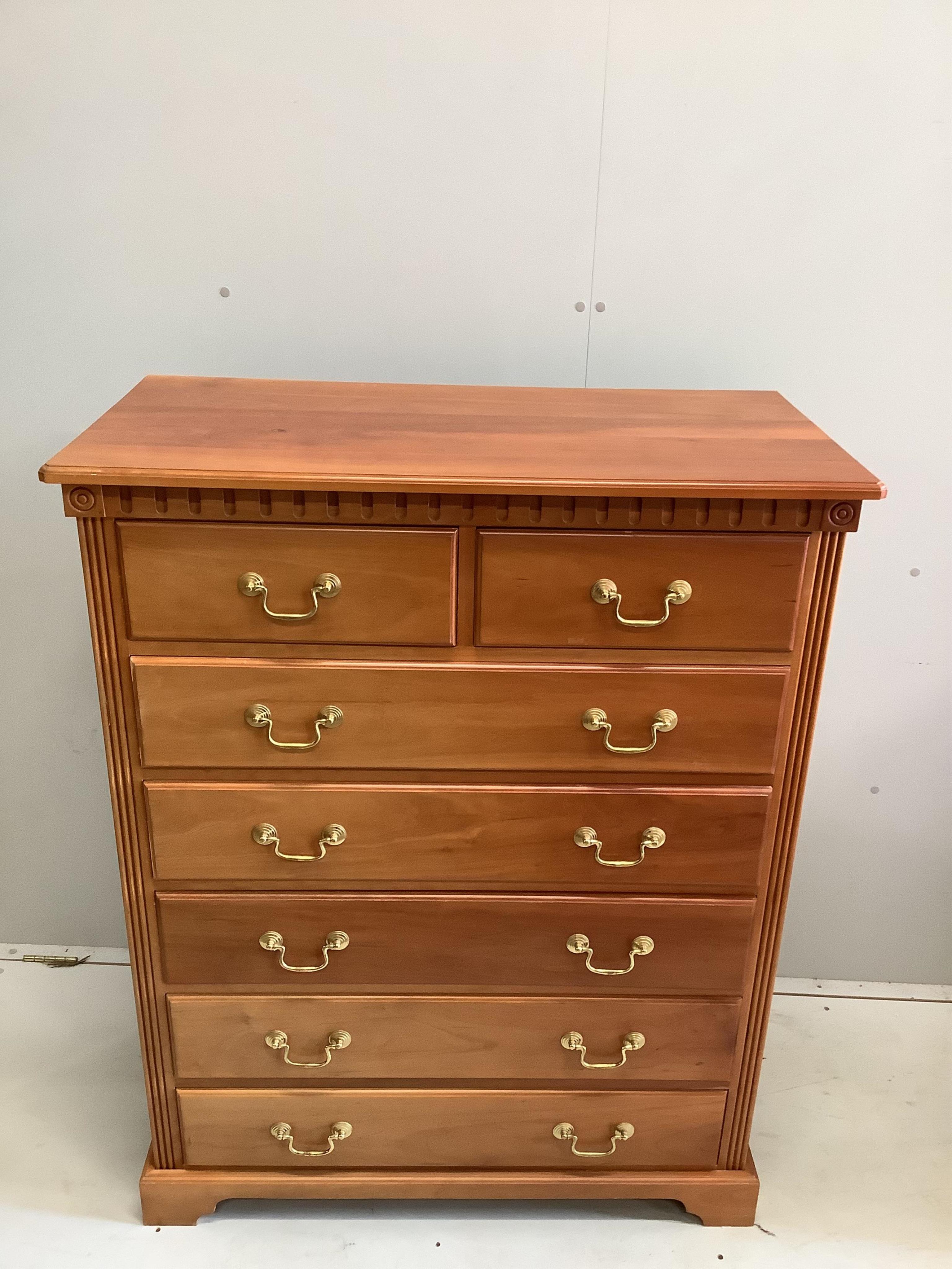 A reproduction cherry chest of drawers, width 97cm, depth 48cm, height 122cm. Condition - fair